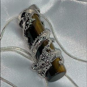 Tiger Eye and Silver dragon in a Silver chain.
